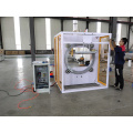 Horizontal stretch film wrapping machine for wooden door